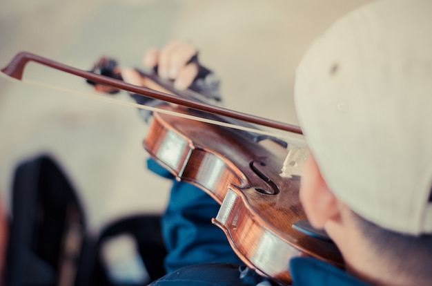 Street musician playing violin