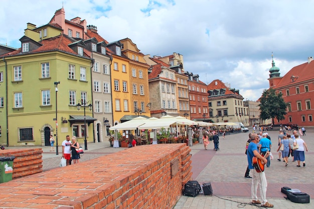 Street musicians play on the streets of Warsaw People rest in Warsaw