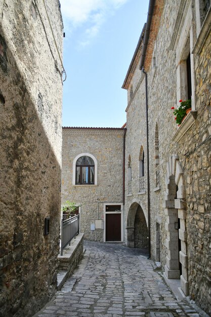 A street between the old houses of Pietragalla a village in the Basilicata Italy