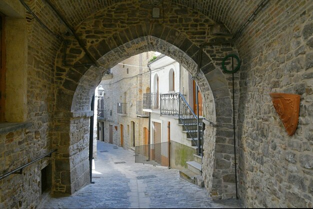 A street among the old houses of Pietramontecorvino a village in the state of Puglia Italy