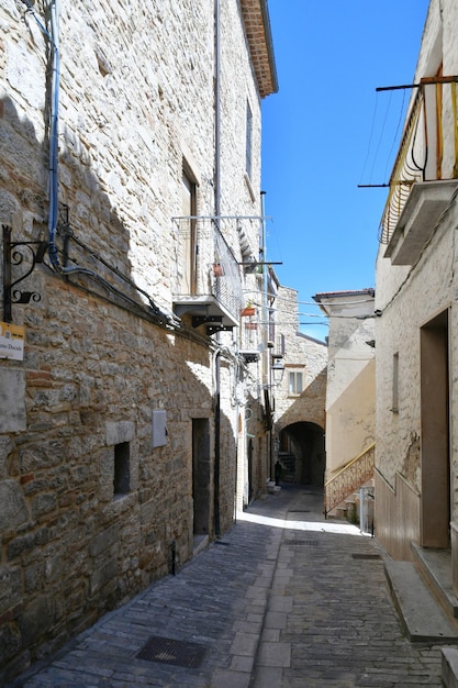 A street among the old houses of Pietramontecorvino a village in the state of Puglia Italy