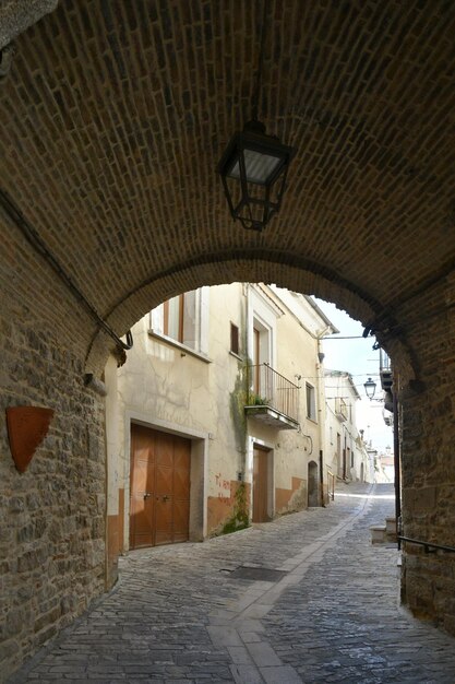 A street among the old houses of Pietramontecorvino a village in the state of Puglia Italy