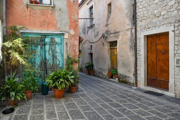 A street between the old houses of Teggiano a medieval village in Campania Italy