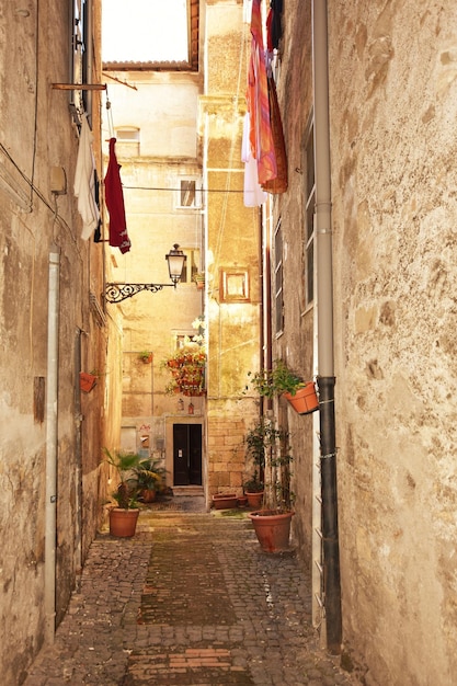 Photo a street between the old stone houses of anagni a medieval village in the lazio region italy