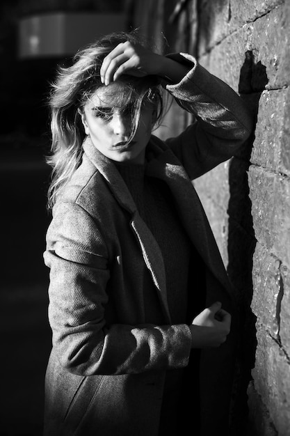 Street portrait of a girl in a coat