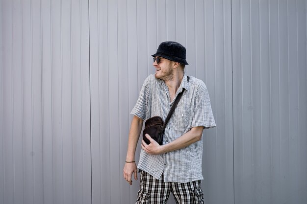 Street portrait of a surprised hipster