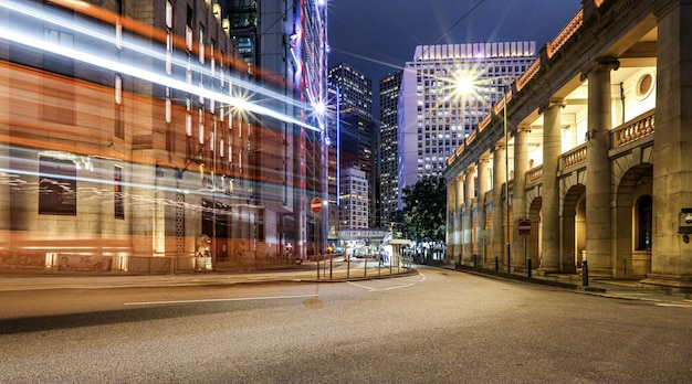 A street scene with a building and a light on the side that says'no parking '