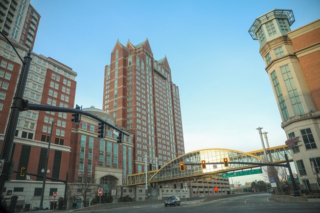 A street scene with a sign that says " the city of indianapolis ".