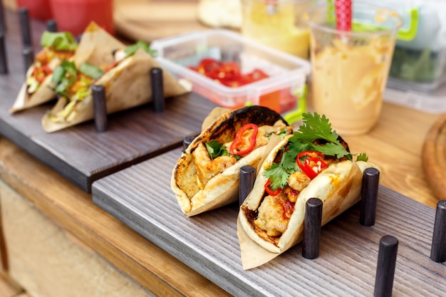 street vendor selling taco outdoors