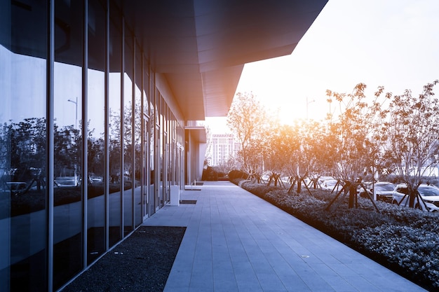 Street view of the entrance and exit of the financial district office building with a blue background