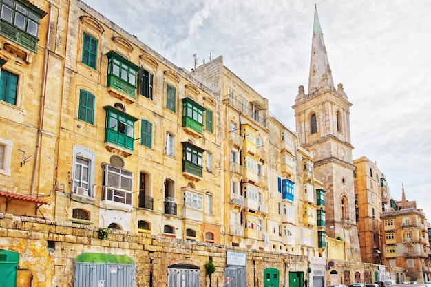 Street view on spire of Saint Paul Cathedral in Valletta old town, Malta