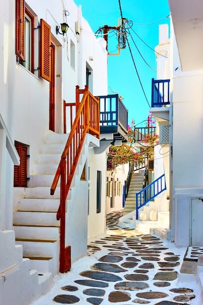 Street with white little houses in Mykonos (Chora) town, Greece