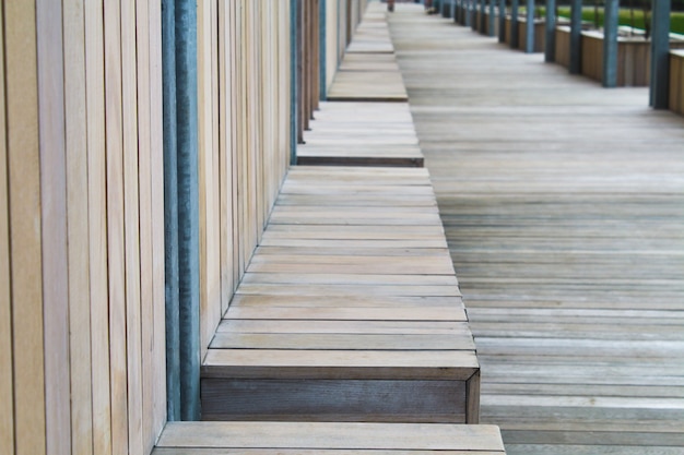 Street wooden bench in perspective