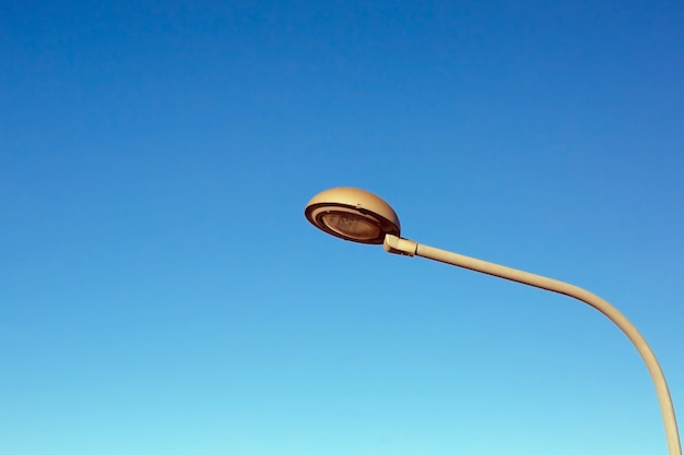 Streetlight with blue sky b