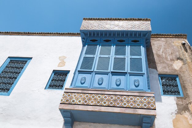 Streets of Sidi Bou Said with traditional white and blue architecture Tunisia