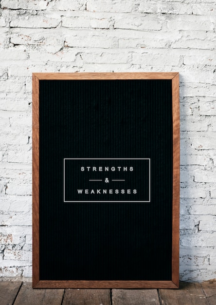 Photo strength and weakness life motivation blackboard