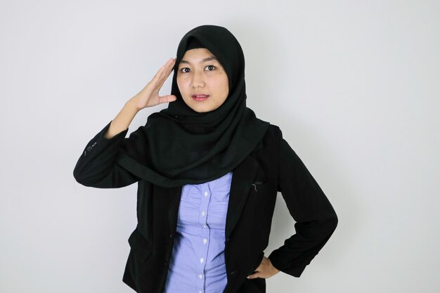 Stress and confused gesture young asian islam woman wearing\
headscarf