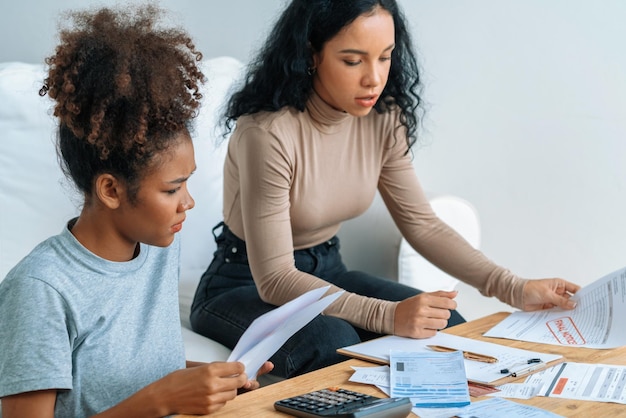 Stressed African American women has financial problems with credit card debt to pay crucial show concept of bad personal money and mortgage pay management crisis