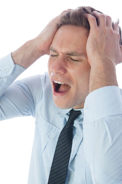 Photo stressed businessman with hands on head