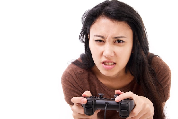 Stressed exited female gamer isolated