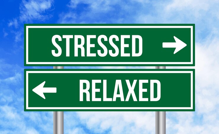 फोटो stressed or relaxed road sign on blue sky background