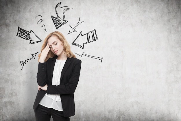 Stressed woman in suit