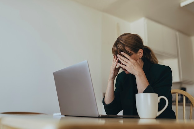 Stressed woman working from home during coronavirus quarantine