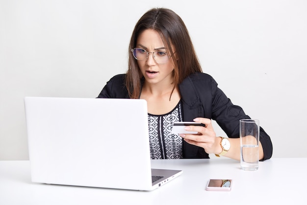 Stressful woman makes payment online