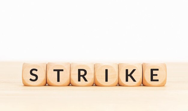 Strike word on wooden blocks Copy space