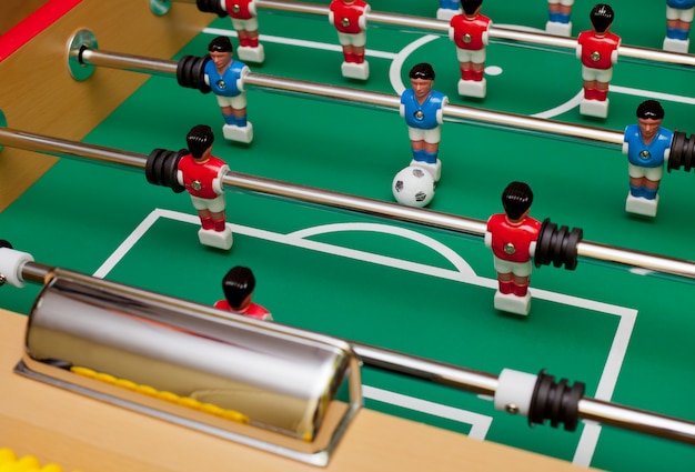 Striker in table football, aim at the goal.