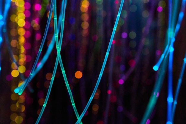 Strings of glowing neon lights in all colors