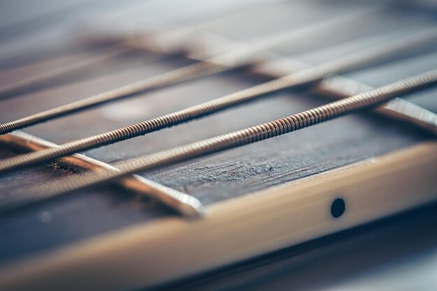 Фото Струны на макросъемке классической акустической гитары
