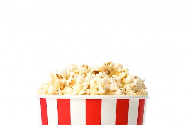 Striped bucket with popcorn isolated on white background