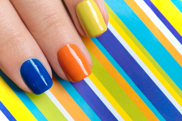 Photo striped manicure on short nails