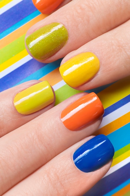 Photo striped manicure on short nails