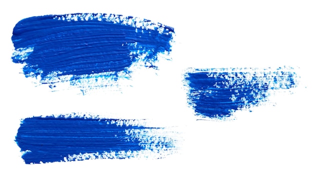 写真 白い背景に分離された青いペンキのストローク
