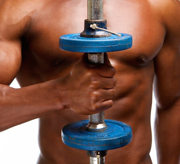 Strong african american man lifting gym weight