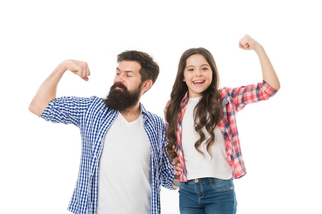 Strong as my father. Child and dad best friends show biceps gesture. Parenthood and childhood. Fathers day concept. Lovely father and cute kid strong family. Father and daughter hug white background.