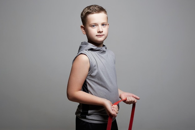 Strong Child Little Boy with fitness Tape Sport Boy