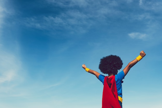 Photo strong girl in blue superhero outfit