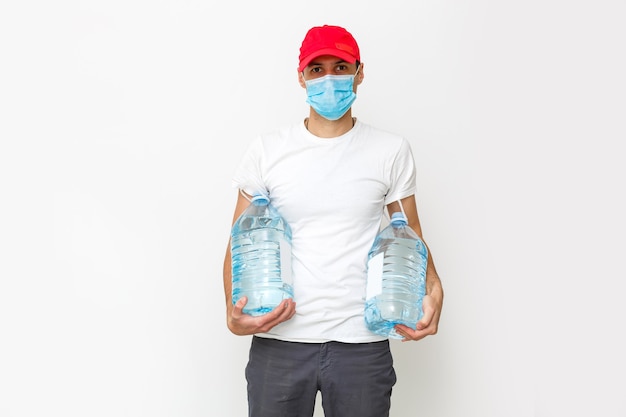 Strong water delivery man in protective mask. Isolated on white.