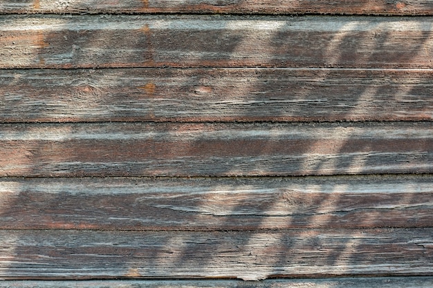 the structure of an old wooden wall as a natural background