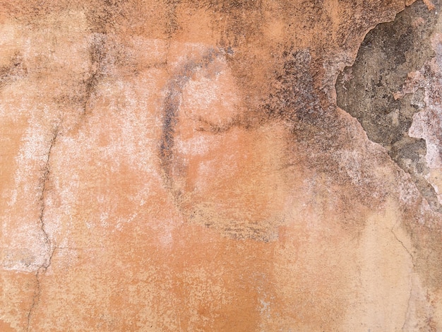 イタリアのレンガの壁の漆喰。壁のテクスチャ背景。