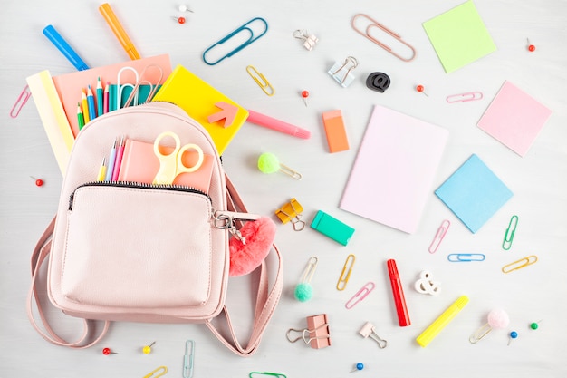 Student backpack and various school supplies. Studing, education and back to school concept 