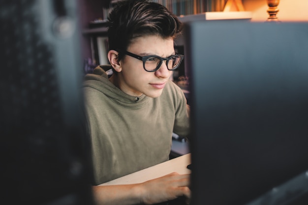 Student boy focusing