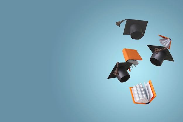 Photo student caps and textbooks are flying on a blue background copy space