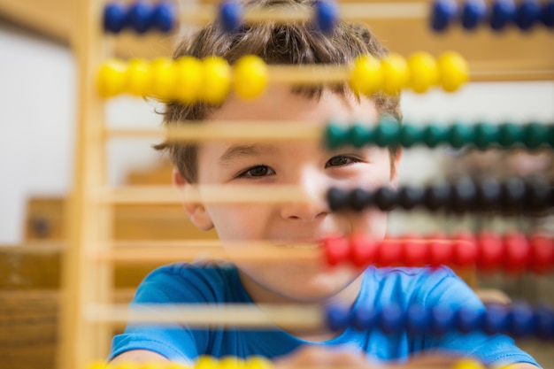  Student doing maths on abacus 