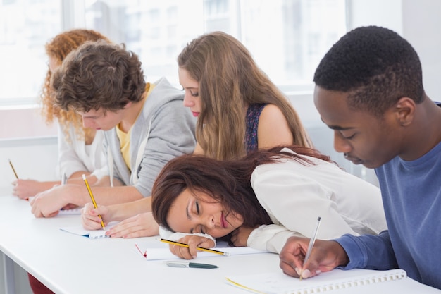 Photo student dozing during a class