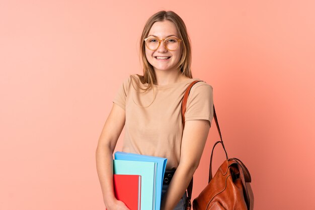 Student girl holding notebooks