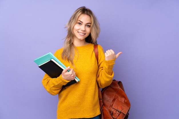 Student girl holding notebooks